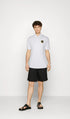 A|X ARMANI EXCHANGE METALLIC LOGO POLO